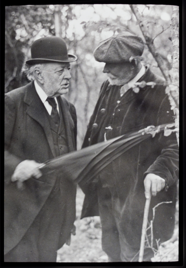 Robert Drane Talking to an unidentified member of the society